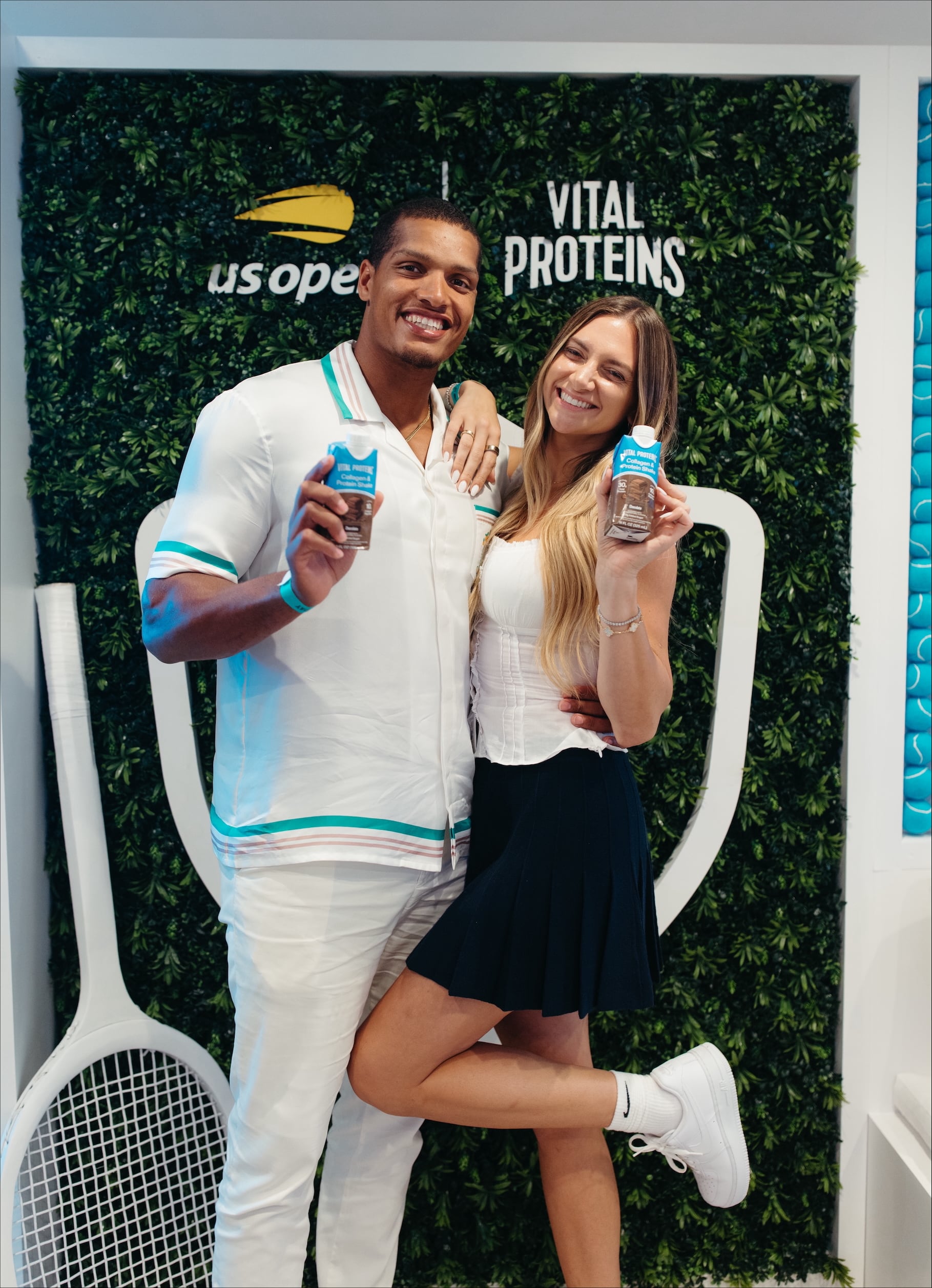Podcast hosts Allison Kuch and Isaac Rochell, who taped live recordings of their hit podcasts onsite from the US Open as part of the Vital Proteins partnership.