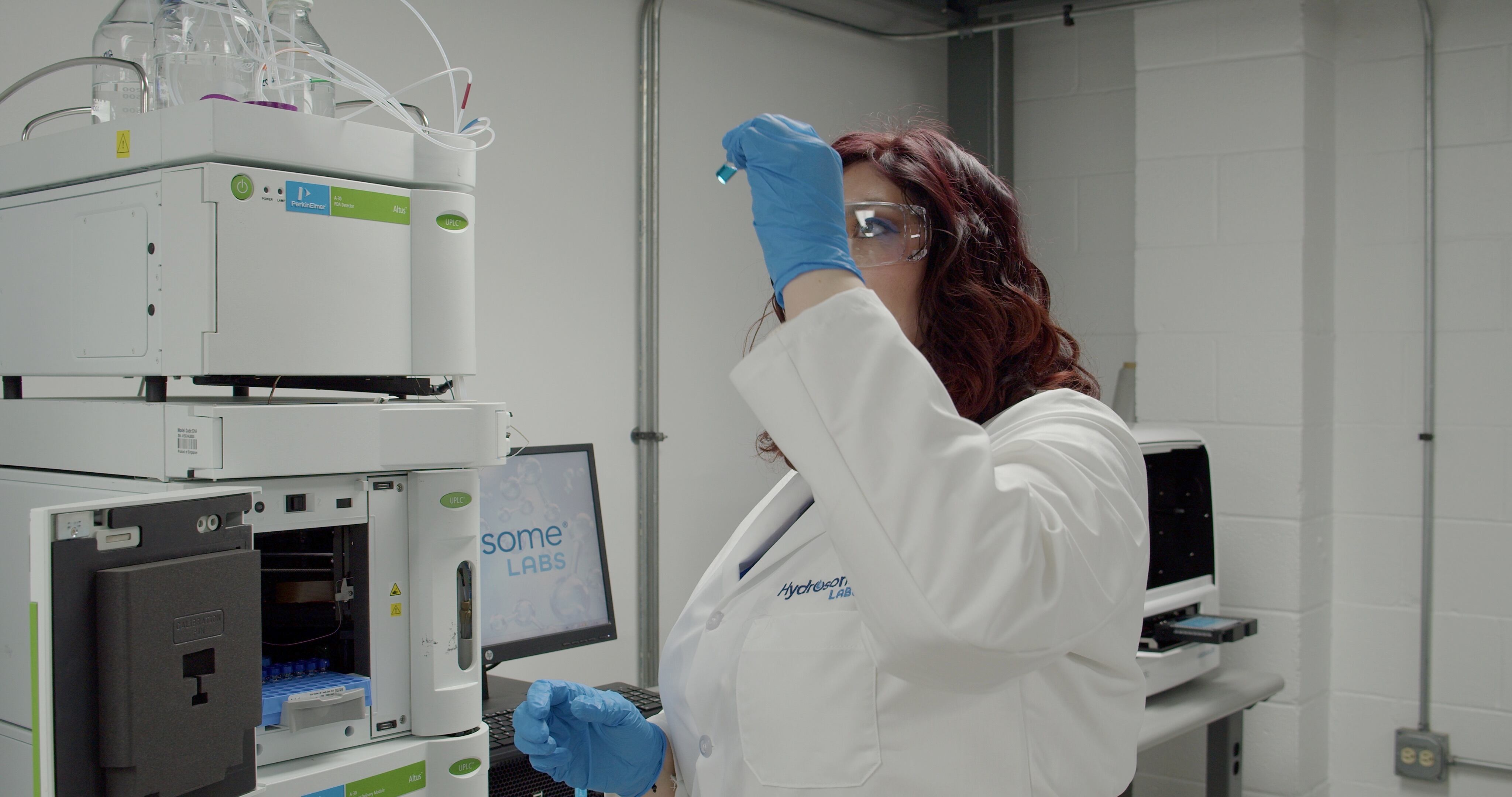Hydrosome Labs scientist analysing test tube
