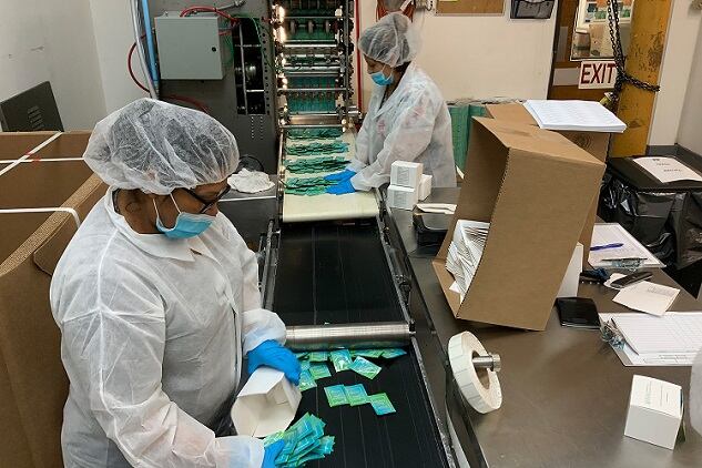 INW manufacturing single-use sachets of hand sanitzer for donation