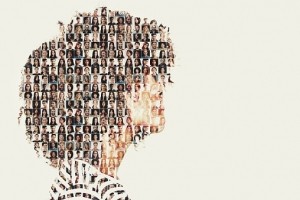 A photo mosaic of the profile of a woman with curly hair.