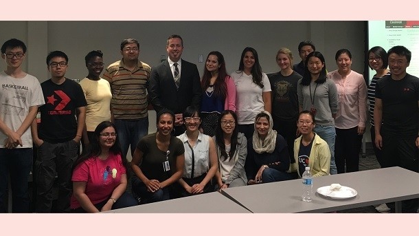 here, surrounded by graduate students, is Neil J MacKinnon, Dean and Professor at the James L Winkle College of Pharmacy at the University of Cincinnati (image courtesy of MacKinnon)
